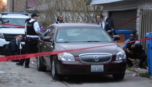 A Oak Park Police officer was shot early Sunday in the 300 block of West 103rd Street and two people were taken into custody, one of whom had been shot, in the 9900 block of Princeton. | Brian Jackson/For the Sun-Times