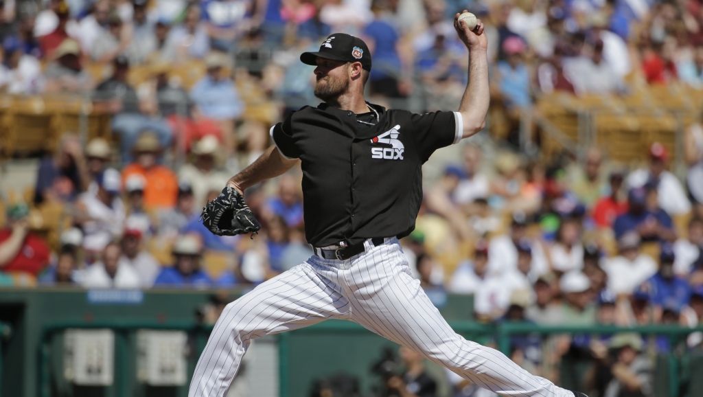 Chicago White Sox starting pitcher John Danks throws against the Chicago Cubs during a spring training baseball game Friday, March 18, 2016, in Phoenix. (AP Photo/Jae C. Hong)